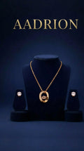 Gold-Plated Oval Crystal Pendant Necklace with Crystal Stud Earrings Set